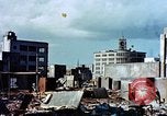 Image of U.S. sailors in Japanese city downtown Nagasaki Japan, 1945, second 29 stock footage video 65675055940