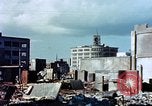 Image of U.S. sailors in Japanese city downtown Nagasaki Japan, 1945, second 30 stock footage video 65675055940