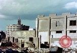 Image of U.S. sailors in Japanese city downtown Nagasaki Japan, 1945, second 34 stock footage video 65675055940
