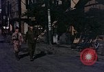 Image of U.S. sailors in Japanese city downtown Nagasaki Japan, 1945, second 61 stock footage video 65675055940