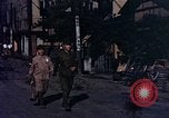 Image of U.S. sailors in Japanese city downtown Nagasaki Japan, 1945, second 62 stock footage video 65675055940