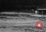 Image of winter flood United States USA, 1957, second 6 stock footage video 65675055942