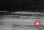 Image of winter flood United States USA, 1957, second 8 stock footage video 65675055942