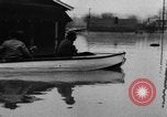 Image of winter flood United States USA, 1957, second 18 stock footage video 65675055942