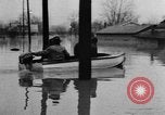Image of winter flood United States USA, 1957, second 23 stock footage video 65675055942