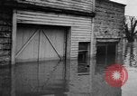 Image of winter flood United States USA, 1957, second 39 stock footage video 65675055942