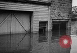 Image of winter flood United States USA, 1957, second 40 stock footage video 65675055942