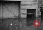 Image of winter flood United States USA, 1957, second 42 stock footage video 65675055942