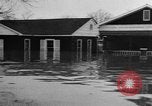Image of winter flood United States USA, 1957, second 47 stock footage video 65675055942
