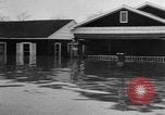 Image of winter flood United States USA, 1957, second 48 stock footage video 65675055942