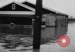 Image of winter flood United States USA, 1957, second 50 stock footage video 65675055942
