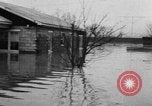 Image of winter flood United States USA, 1957, second 52 stock footage video 65675055942