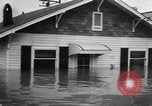 Image of winter flood United States USA, 1957, second 55 stock footage video 65675055942