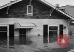 Image of winter flood United States USA, 1957, second 56 stock footage video 65675055942