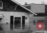 Image of winter flood United States USA, 1957, second 57 stock footage video 65675055942