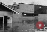 Image of winter flood United States USA, 1957, second 58 stock footage video 65675055942