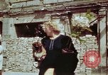 Immagine di Donna tedesca Berlino Germania, 1945, secondo 15 filmato di repertorio 65675055972