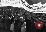Image of civilians gathered for rally Japan, 1948, second 16 stock footage video 65675055993