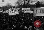 Image of civilians gathered for rally Japan, 1948, second 26 stock footage video 65675055993