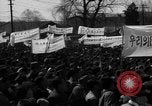 Image of civilians gathered for rally Japan, 1948, second 27 stock footage video 65675055993