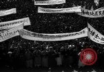 Image of civilians gathered for rally Japan, 1948, second 38 stock footage video 65675055993