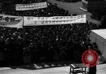 Image of civilians gathered for rally Japan, 1948, second 44 stock footage video 65675055993