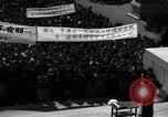 Image of civilians gathered for rally Japan, 1948, second 45 stock footage video 65675055993