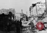 Image of German civilians search through rubble of bombed city Worms Germany, 1945, second 12 stock footage video 65675056112