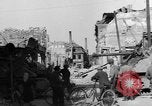 Image of German civilians search through rubble of bombed city Worms Germany, 1945, second 13 stock footage video 65675056112