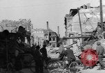 Image of German civilians search through rubble of bombed city Worms Germany, 1945, second 14 stock footage video 65675056112