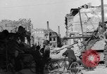 Image of German civilians search through rubble of bombed city Worms Germany, 1945, second 15 stock footage video 65675056112