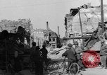 Image of German civilians search through rubble of bombed city Worms Germany, 1945, second 16 stock footage video 65675056112