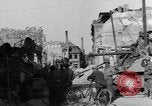 Image of German civilians search through rubble of bombed city Worms Germany, 1945, second 18 stock footage video 65675056112