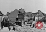 Image of German civilians search through rubble of bombed city Worms Germany, 1945, second 19 stock footage video 65675056112