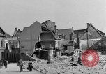 Image of German civilians search through rubble of bombed city Worms Germany, 1945, second 20 stock footage video 65675056112