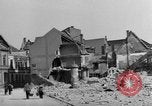 Image of German civilians search through rubble of bombed city Worms Germany, 1945, second 23 stock footage video 65675056112