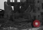 Image of German civilians search through rubble of bombed city Worms Germany, 1945, second 33 stock footage video 65675056112