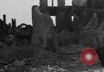 Image of German civilians search through rubble of bombed city Worms Germany, 1945, second 35 stock footage video 65675056112