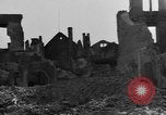 Image of German civilians search through rubble of bombed city Worms Germany, 1945, second 39 stock footage video 65675056112