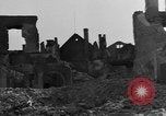 Image of German civilians search through rubble of bombed city Worms Germany, 1945, second 40 stock footage video 65675056112