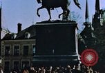 Image of civilians in street square Luxembourg, 1945, second 10 stock footage video 65675056170