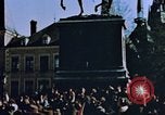 Image of civilians in street square Luxembourg, 1945, second 11 stock footage video 65675056170