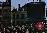 Image of civilians in street square Luxembourg, 1945, second 13 stock footage video 65675056170