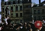 Image of civilians in street square Luxembourg, 1945, second 15 stock footage video 65675056170