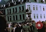 Image of civilians in street square Luxembourg, 1945, second 23 stock footage video 65675056170