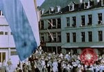 Image of civilians in street square Luxembourg, 1945, second 26 stock footage video 65675056170