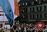 Image of civilians in street square Luxembourg, 1945, second 27 stock footage video 65675056170