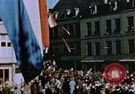 Image of civilians in street square Luxembourg, 1945, second 28 stock footage video 65675056170