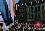 Image of civilians in street square Luxembourg, 1945, second 29 stock footage video 65675056170