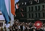 Image of civilians in street square Luxembourg, 1945, second 30 stock footage video 65675056170